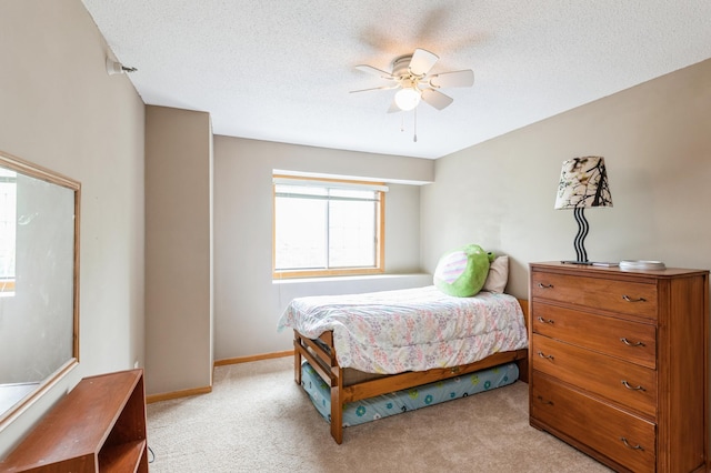 2752 Autumnwood Ln, Minnetonka, MN 55305 - bedroom featuring light carpet, a textured ceiling, and ceiling fan