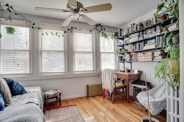 interior space featuring ceiling fan