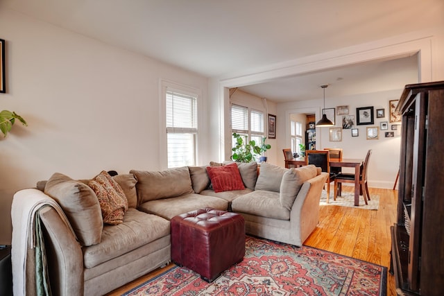 living area with light wood-style floors