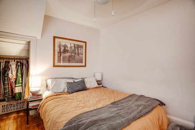 bedroom with a closet and wood-type flooring