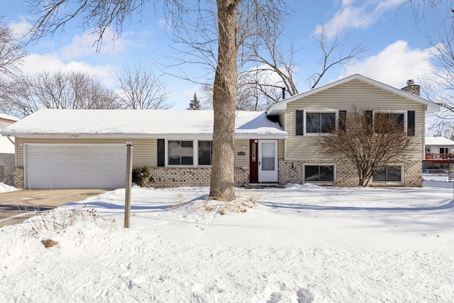 split level home featuring a garage