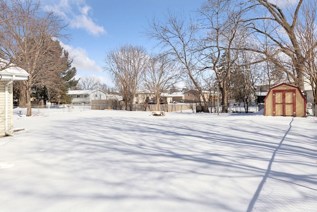 view of yard covered in snow