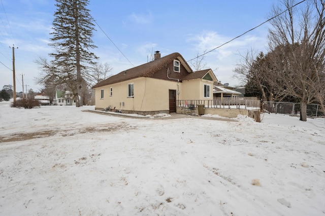 view of snow covered property