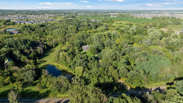 bird's eye view featuring a water view and a view of trees