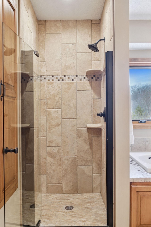 full bathroom featuring a stall shower