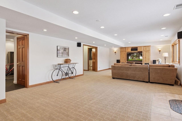 living room with recessed lighting, visible vents, baseboards, and light carpet