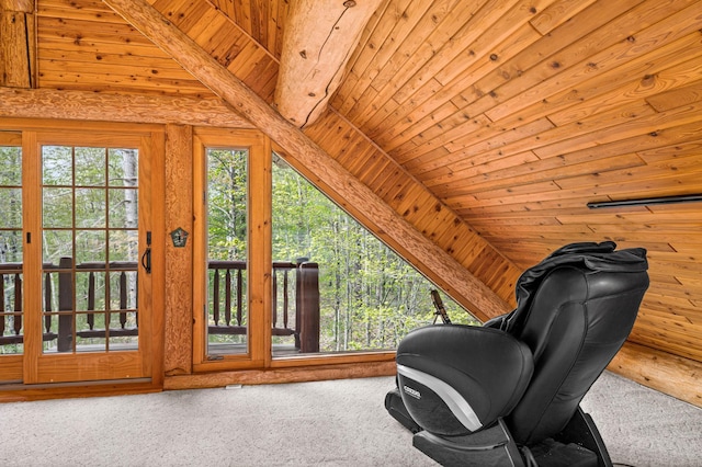 sitting room featuring lofted ceiling, carpet, wood walls, and wooden ceiling