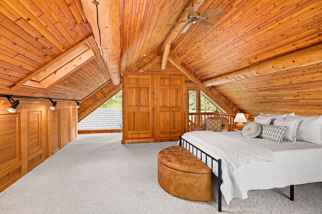 bedroom with wooden walls, wooden ceiling, vaulted ceiling with beams, and light colored carpet