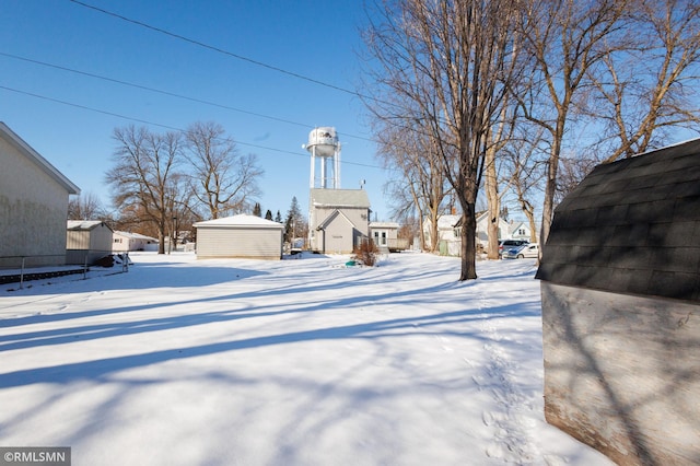 view of yard covered in snow