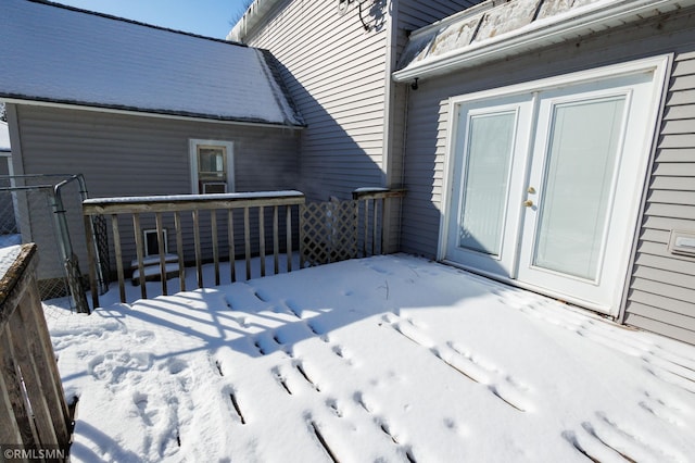 view of snow covered deck