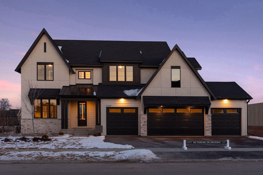 modern farmhouse with a garage