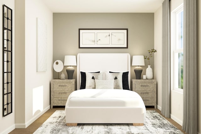 bedroom featuring carpet and baseboards