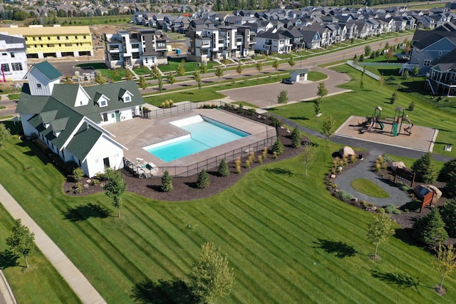 birds eye view of property with a residential view