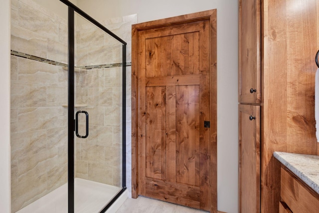 bathroom with a stall shower