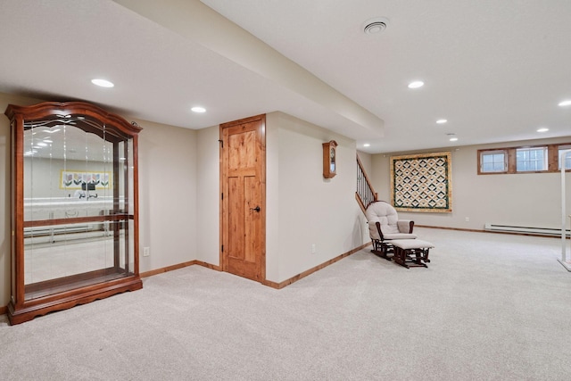 unfurnished room featuring recessed lighting, baseboards, carpet floors, and a baseboard radiator