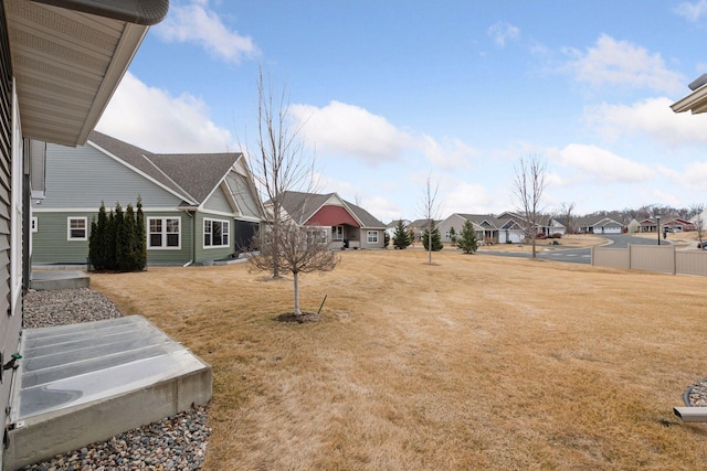 view of yard featuring a residential view