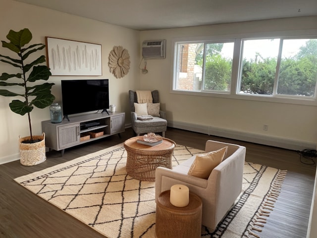 living room with dark hardwood / wood-style flooring and a wall mounted air conditioner