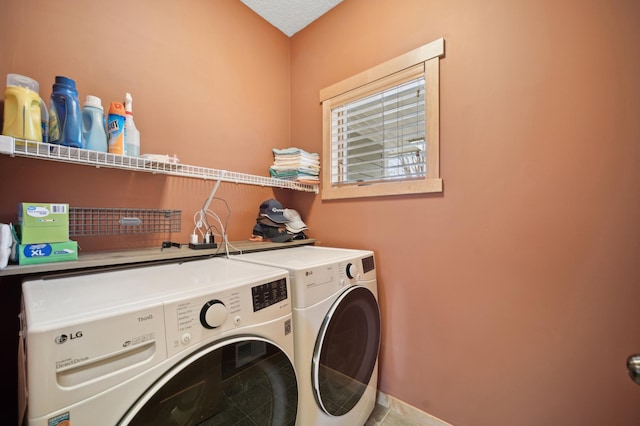 washroom featuring independent washer and dryer