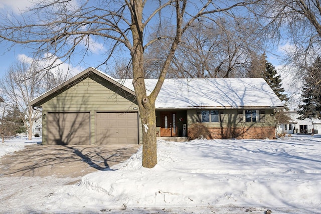 single story home featuring a garage