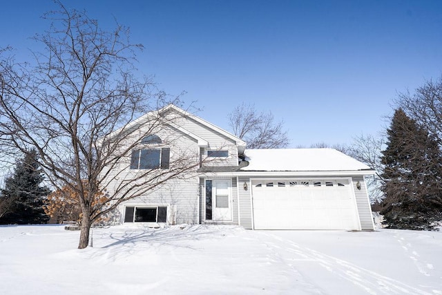 front of property featuring a garage