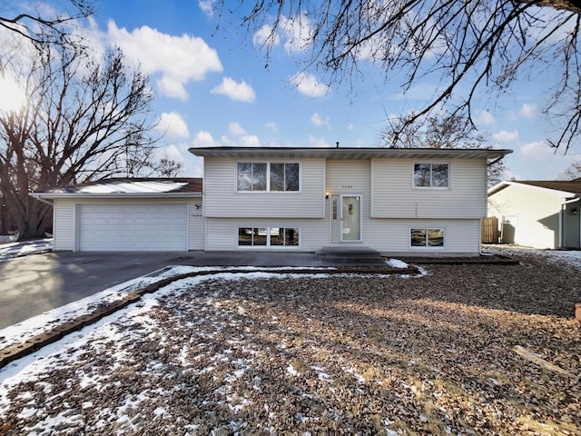 bi-level home featuring a garage