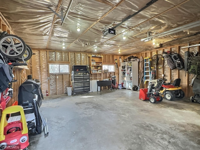 garage featuring a garage door opener