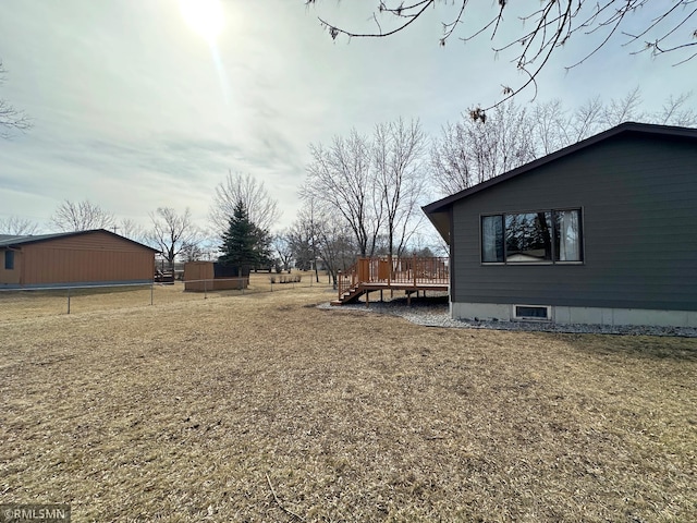 view of yard with a deck