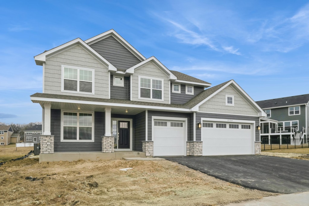 craftsman inspired home with a porch