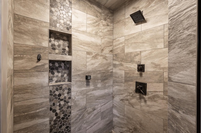 details featuring a tile shower