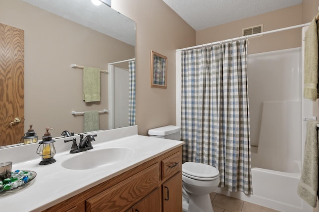 full bath featuring a textured ceiling, toilet, visible vents, vanity, and tile patterned floors