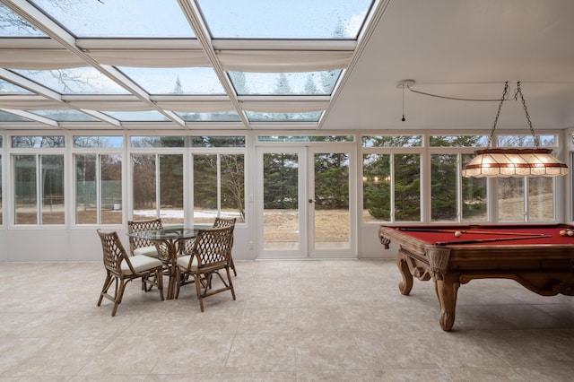 sunroom / solarium featuring a skylight and pool table