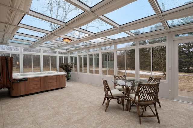 sunroom / solarium with a skylight and coffered ceiling