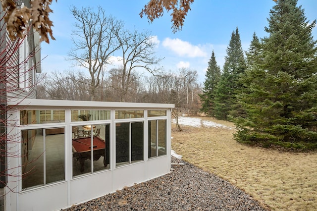 view of yard featuring a sunroom