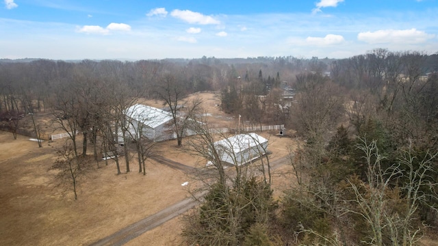 aerial view featuring a rural view and a view of trees