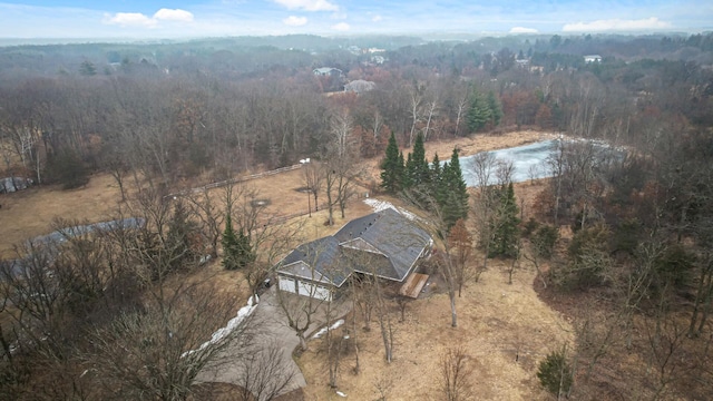 aerial view featuring a forest view