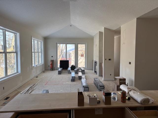 kitchen with lofted ceiling