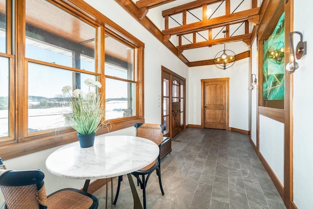 sunroom with beam ceiling