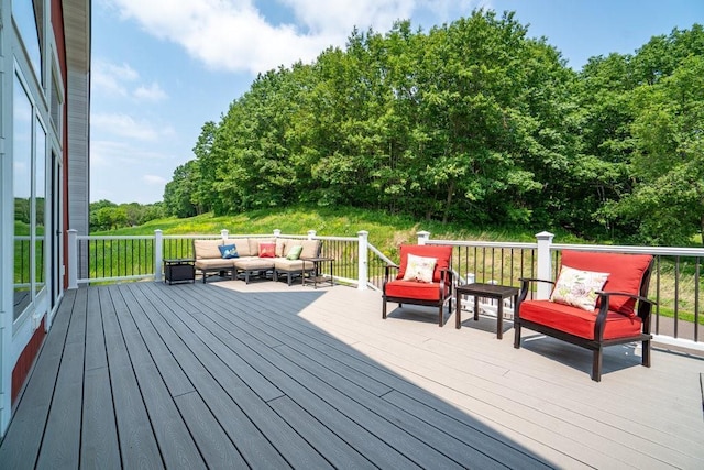 N7900 County Road J, Sherman Twp, WI 54751 - wooden terrace featuring an outdoor living space and view of wooded area