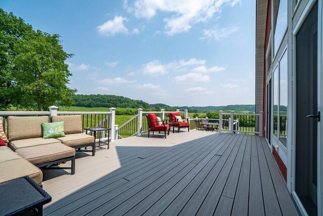N7900 County Road J, Sherman Twp, WI 54751 - wooden terrace featuring an outdoor living space