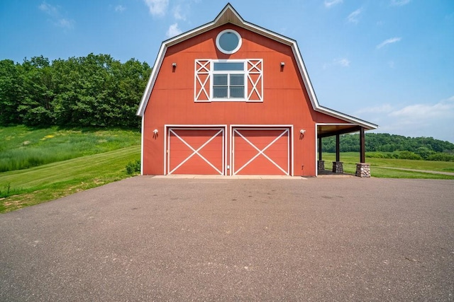 N7900 County Road J, Sherman Twp, WI 54751 - view of barn with a yard