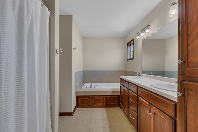 bathroom featuring double vanity, a garden tub, a sink, and tile patterned floors