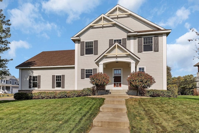 view of front of property featuring a front lawn