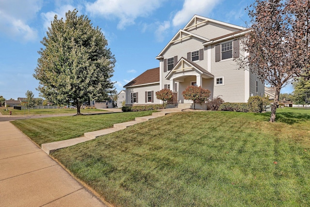 view of front of home with a front lawn