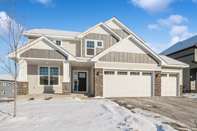 craftsman-style home with a garage