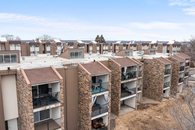 view of building exterior with a residential view