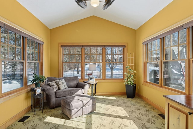 sunroom with vaulted ceiling