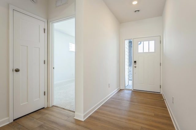 foyer entrance featuring light wood-type flooring