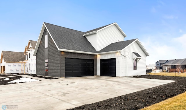 view of property exterior with a garage