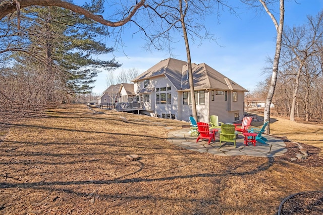 rear view of property with a patio