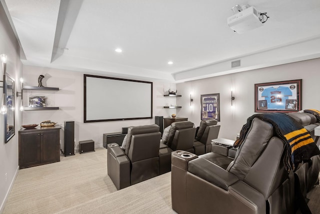 home theater room featuring baseboards, a tray ceiling, recessed lighting, and light colored carpet